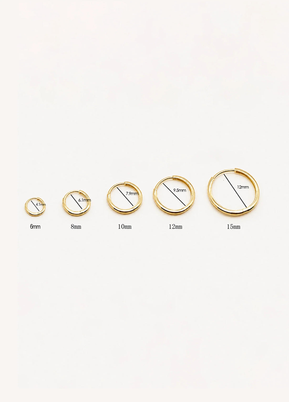 Five solid gold hoop earrings from 6mm to 15mm shown side by side with measurements
