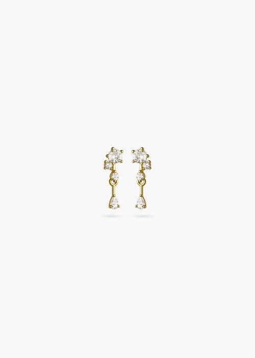 A pair of gold dangle earrings with clear gemstones, shown against a plain white background.