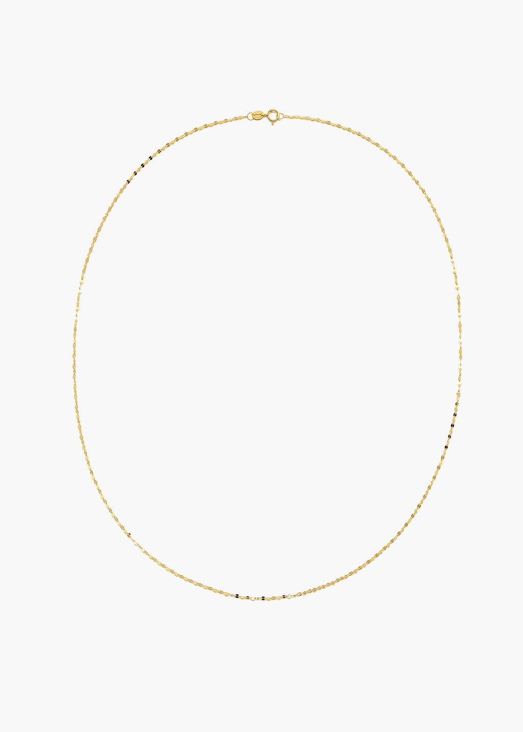 A delicate gold chain necklace with small, evenly spaced black beads, displayed in an oval shape against a solid white background.