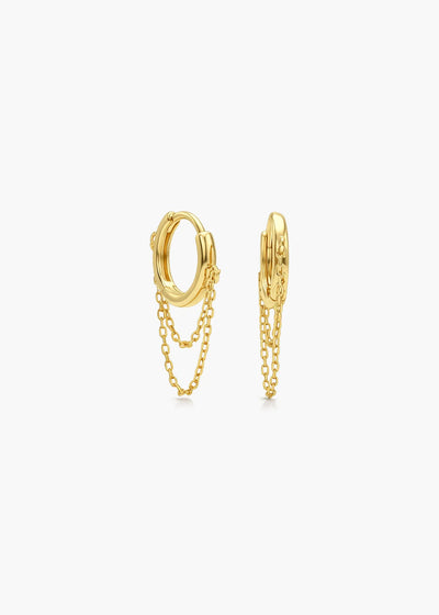 A pair of gold huggie hoop earrings with dangling chain links, shown from the side on a clean white background.