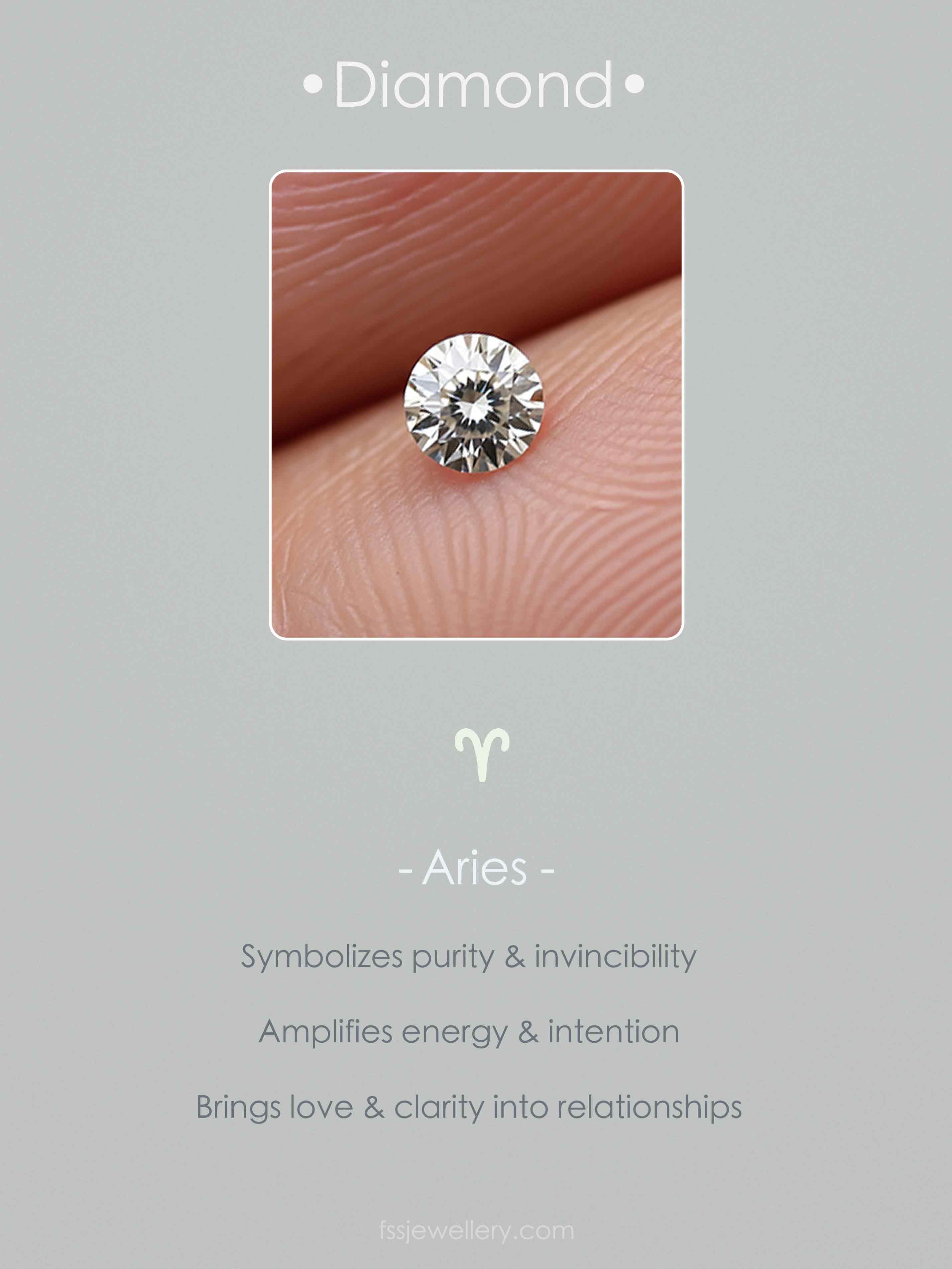 Diamond held between fingers with Aries zodiac symbol