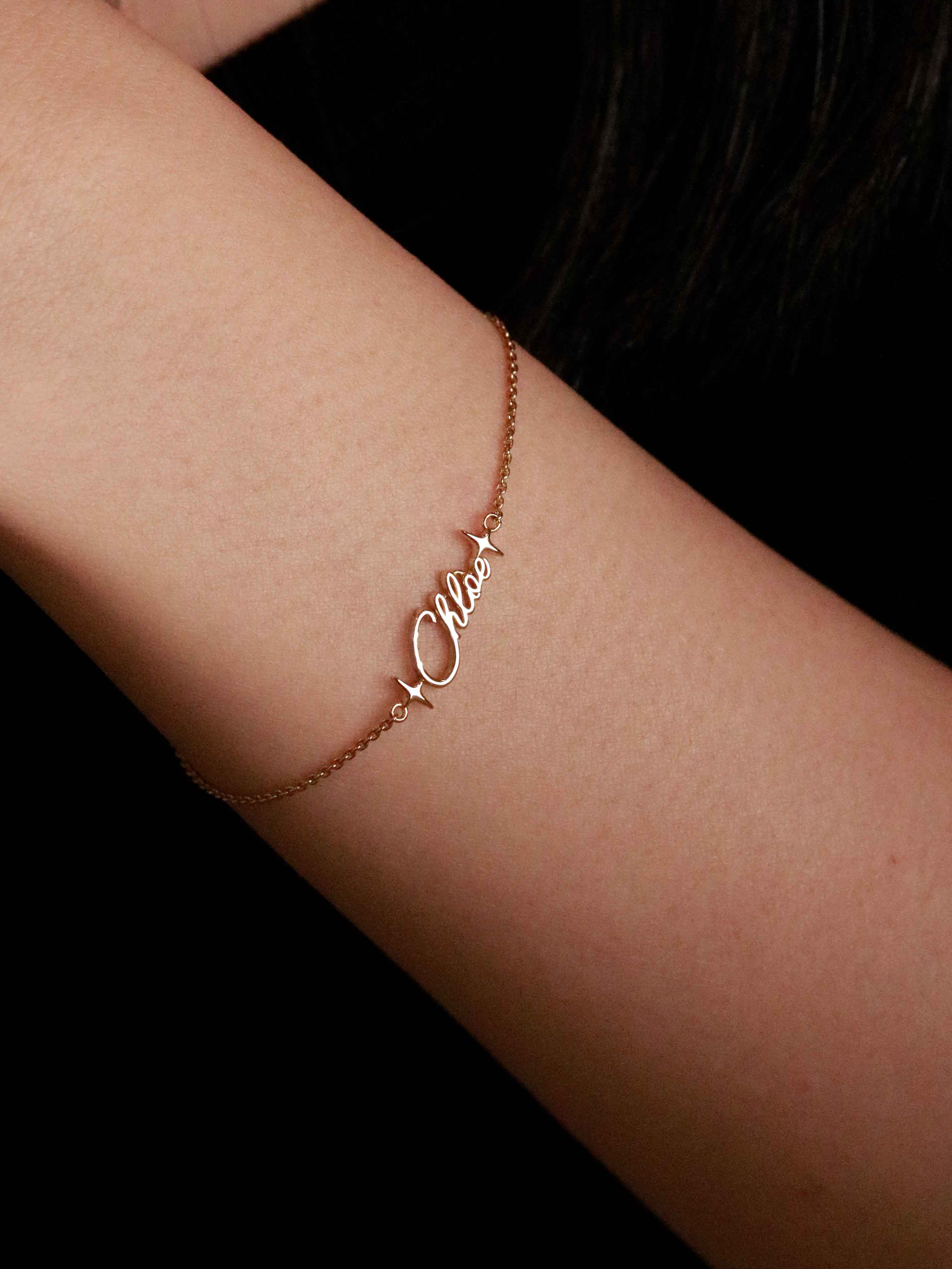 gold bracelet on a wrist 