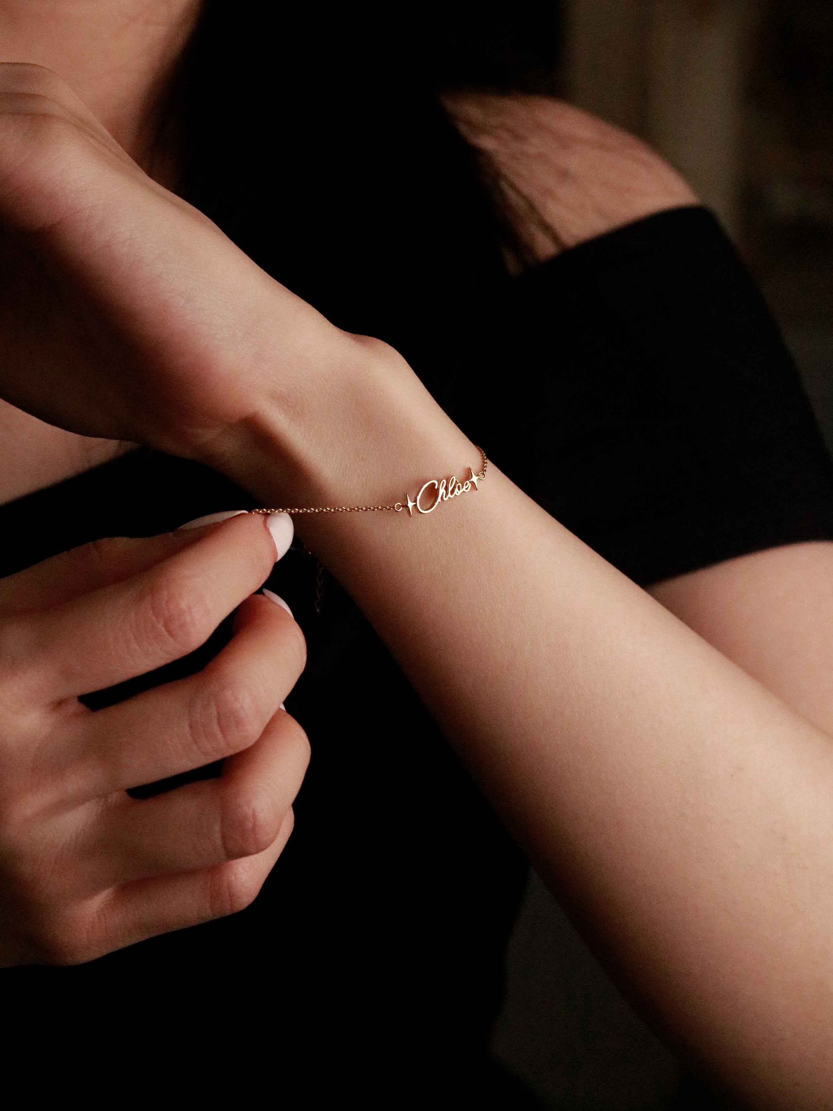 Person wearing a delicate bracelet 