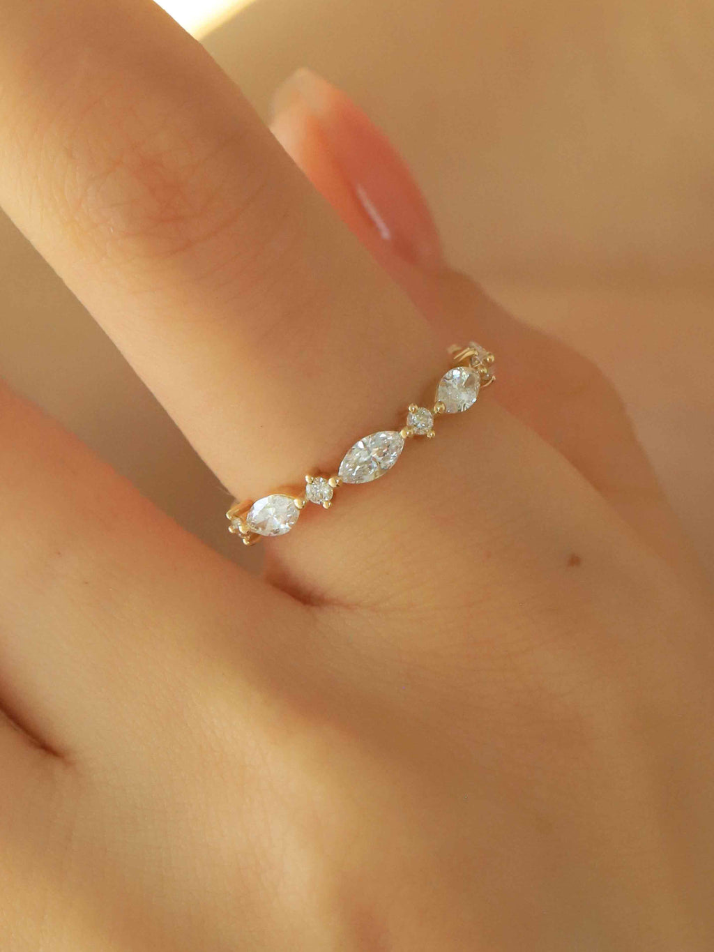 14K gold engagement ring with marquise and round lab-grown diamonds