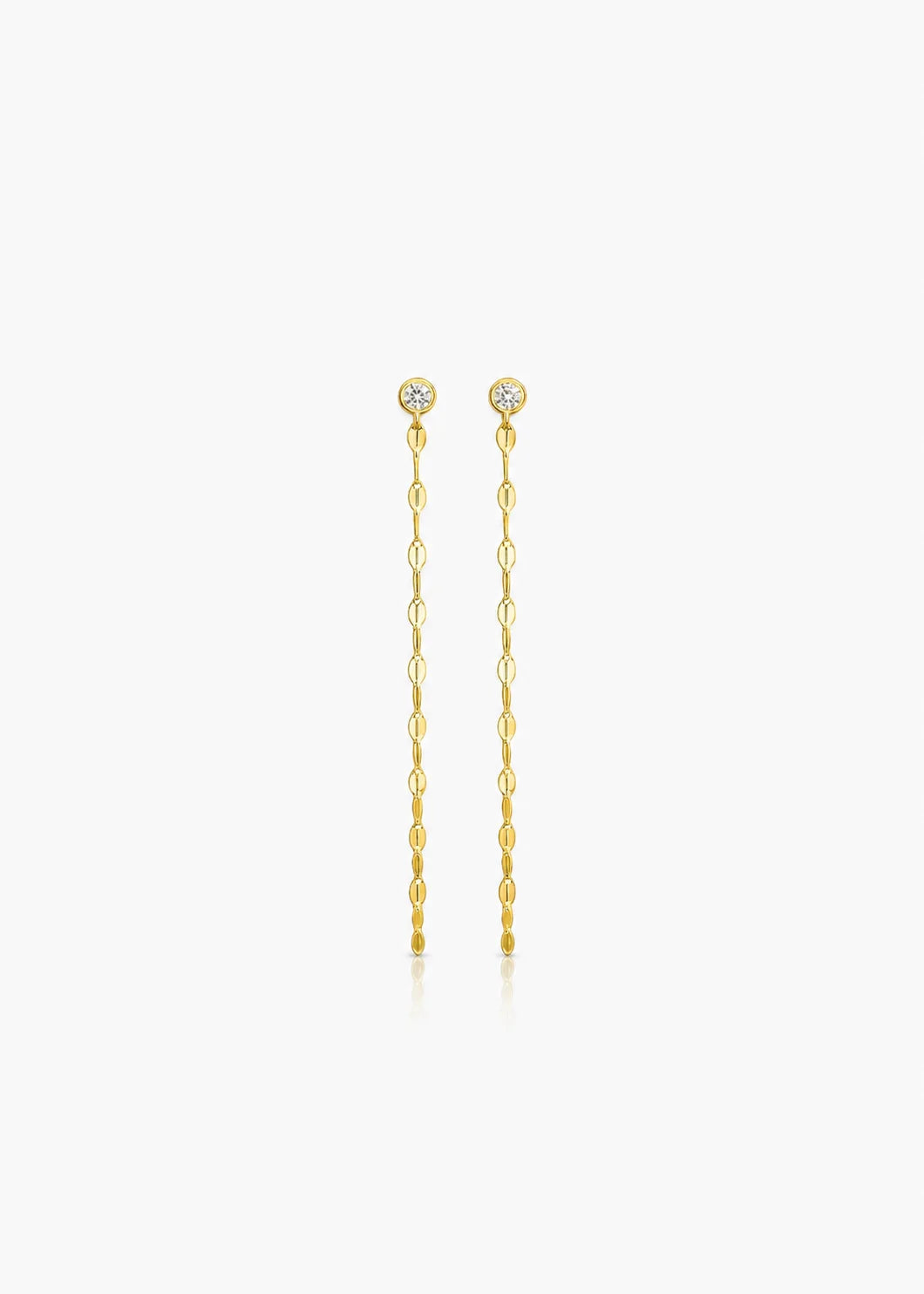 A pair of gold drop earrings with small round clear stones at the top and dangling chain links below, centered on a light gray background.